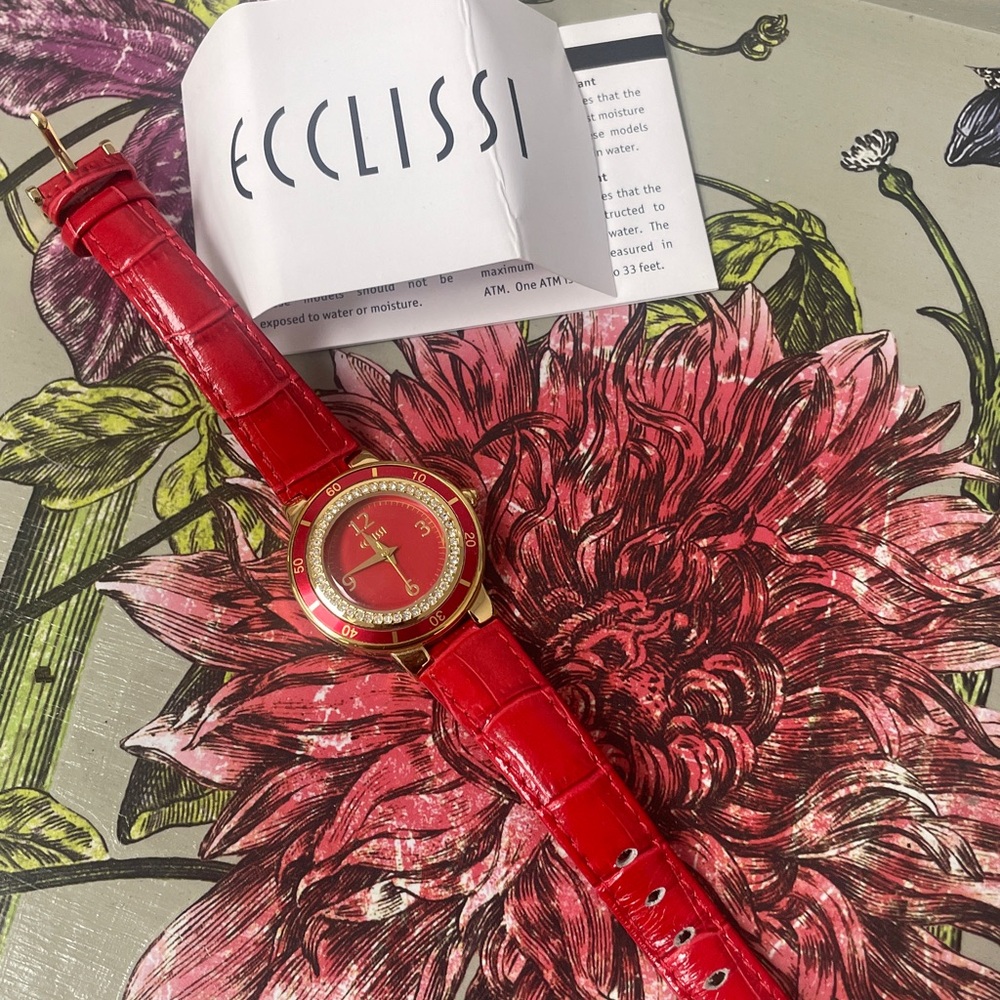 Ecclissi watch with a red genuine leather strap and a crystal-studded bezel.
